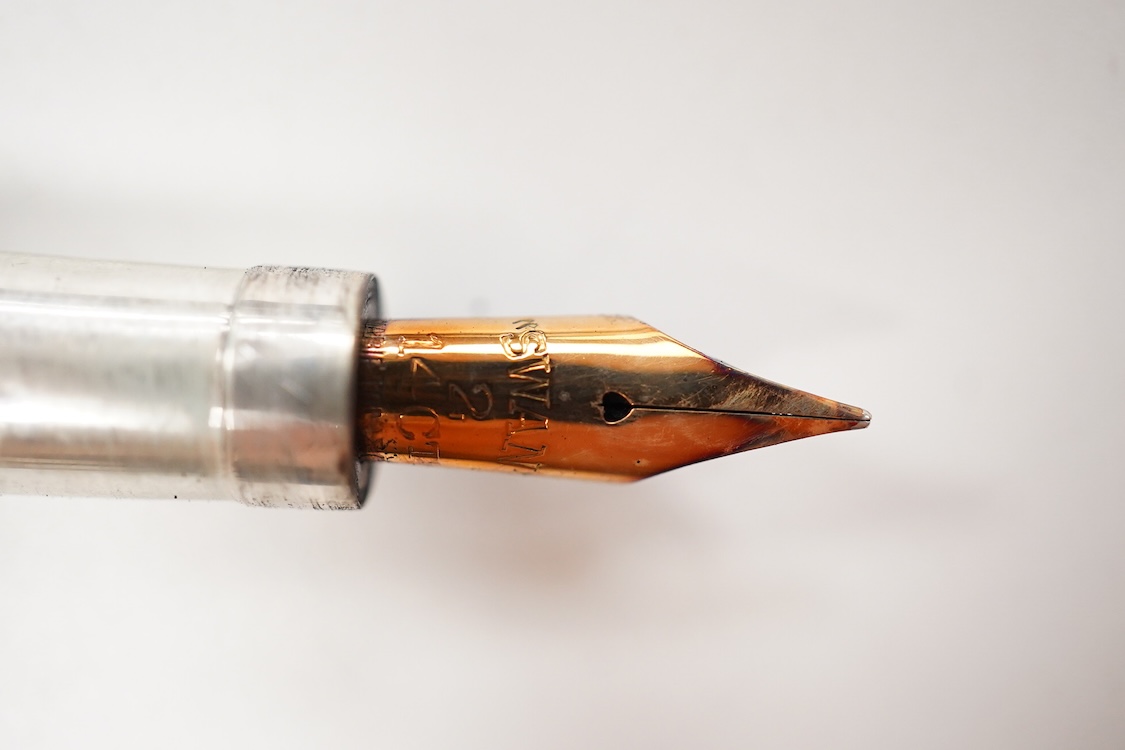 A Mabie Todd & Co. Swan Sterling silver lever filler, Made in USA with 14ct. flexible nib
